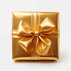 Elegant golden gift box with shiny satin bow for a special occasion.