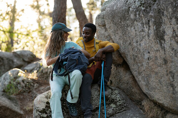 Hiking Couple Sharing a Moment in the Mountain Wilderness