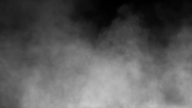 This stock motion graphics video shows smoke rising and filling up an alpha channel background.