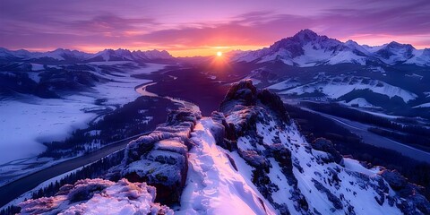 Landscape of snow-capped mountains at sunset in good weather
