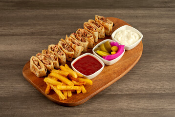 Arabic shawarma meal with french fries, ketchup and mayonnaise
