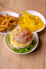 Peruvian food, seafood trio. on wooden table.