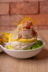 Peruvian food, seafood trio. on wooden table.