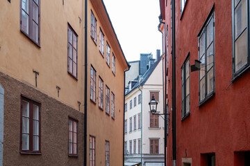 Fototapeta na wymiar Vintage building at Gamla Stan Stockholm, Sweden. Upper part of rental apartment at Old Town.