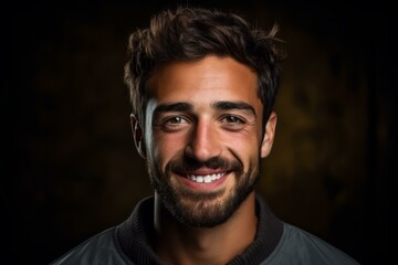 Fototapeta premium Portrait of a smiling young man with a beard