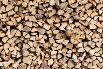 Neatly stacked stack of firewood, firewood for the fireplace, firewood, raw materials, wood rental, calorific value.