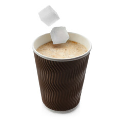 Coffee to go. Sugar cubes falling into paper cup with drink on white background