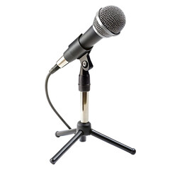 A microphone on a table with a cross on it.