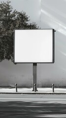 Fototapeta premium Blank billboard on a roadside near a tree