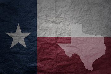 big national flag and map of texas state on a grunge old paper texture background