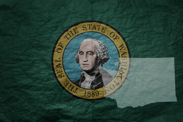 big national flag and map of washington state on a grunge old paper texture background