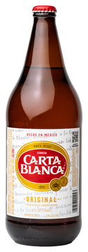 Bottle of Carta Blanca brand Mexican beer isolated on a transparent background PNG	
