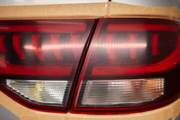 Transformative before and after shots of tail light repainting on a car