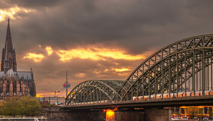 the Hohenzollern Bridge at sunset, cityscape