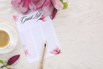 Guest list, coffee, pen and beautiful flowers on white wooden table, flat lay. Space for text