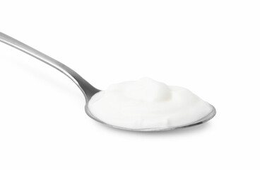 Delicious natural yogurt in spoon isolated on white