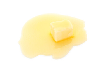 Piece of melting butter isolated on white