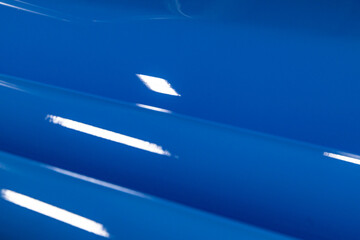 A Symphony in Blue: A Close-Up Exploration of a Lustrous Metal Surface