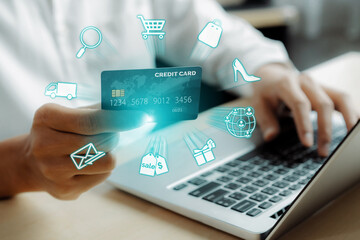 Elegant customer wearing white shirt holding credit card choosing online platform. Smart consumer...