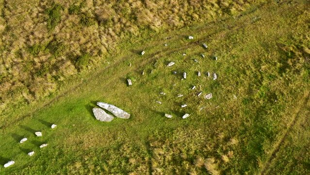 Shovel Down stone rows, Dartmoor. Probably Bronze Age. Aerial video fly up from Fourfold Circle where high end of Rows 3 and 2 join low end of Row 4