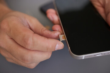 Fototapeta premium SIM card replacement in the phone