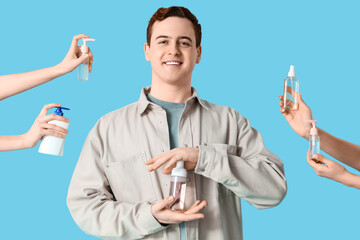 Young man and hands with sanitizers on blue background