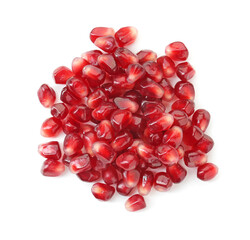 Pile of tasty pomegranate grains isolated on white, top view
