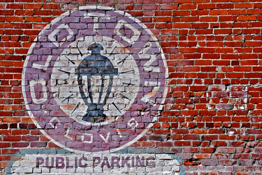 Old Town Clovis sign on old brick wall, Central Valley, California 