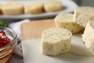 Tasty butter with dill on table, closeup