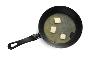 Melting butter in frying pan on white background, top view