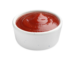 Tasty ketchup in bowl isolated on white. Tomato sauce