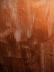 Brown color painted wall with brush paint strokes. Abstract texture background.