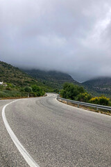 Foggy mountains on road, Andalusia, Sierra Tejeda Natural Park, Spain