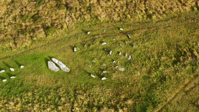 Shovel Down stone rows, Dartmoor. Probably Bronze Age. Aerial video fly up from Fourfold Circle where high end of Rows 3 and 2 join low end of Row 4