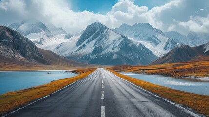 Serpentine mountain road, lush greenery and blue sky. Scenic route natural landscape, travel adventure concept.