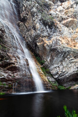 Obraz premium waterfall and stone in the forest in long exposure