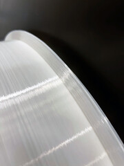 Monofilament winding on the warp coil in the textile industry damage requiring repair