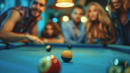 A group of friends gathered around a pool table engaged in a competitive game without needing a drink to enhance the experience.
