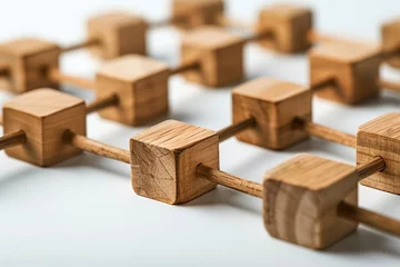 Fotobehang A series of interconnected wooden blocks forming a complex network, illustrating a leader's skill in navigating complex scenarios, isolated bright background, space for text © Naret