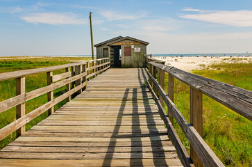Obraz premium Dauphin Island Pier in Dauphin Island Alabama on the Alabama Gulf Coast