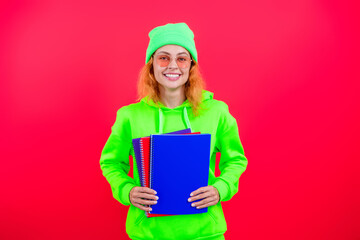 School education. Students life. Young woman back to school. Knowledge day. Education in university. Woman student isolated on pink. September 1. University programs. Knowledge and education