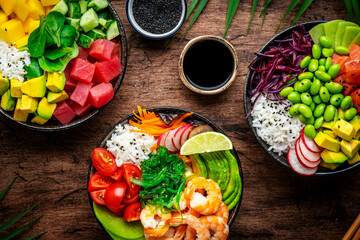 Poke bowls for balanced diet with vegetables, legumes, seafood, avocado and rice, wood table...
