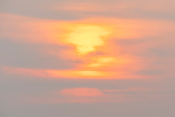 Evening sky time with sun and orange clouds in sunset sky background.Heat wave hot sun, climate...