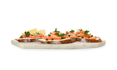 Tasty canapes with salmon, capers, lemon and cream cheese isolated on white