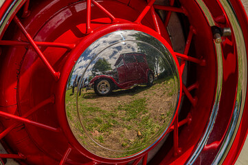  Car Reflection in Moon Hubcap