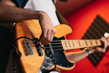 Close-up of a musician playing bass