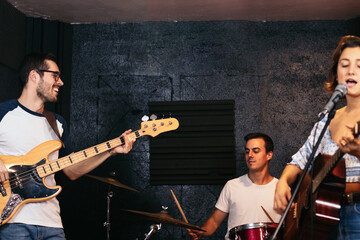 Music group rehearsing in a music venue