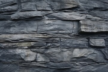 Elegantly stacked stone wall featuring a homogeneous texture and subtle color variation.