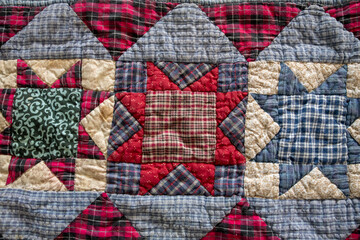 Colorful red, white and blue quilted patterns.