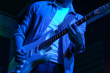 Rock Guitarist In Concert Hall Stage